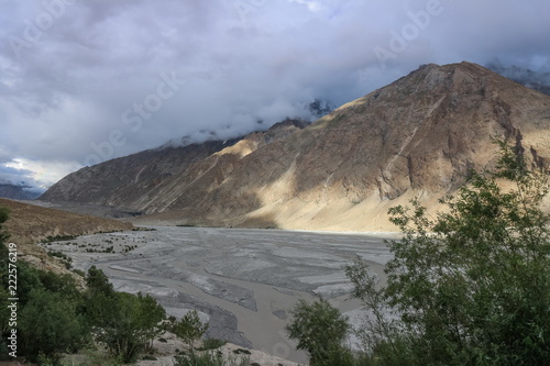 The river flows through the hills and mountain in the Askole village, K2 Base Camp, Pakistan