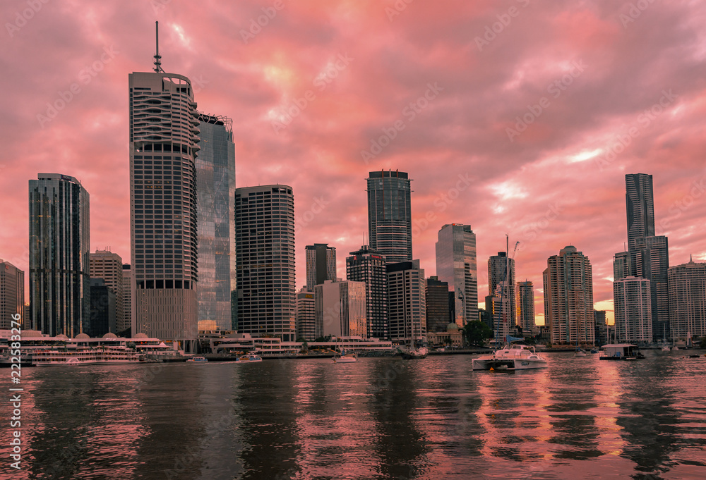 Fototapeta premium brisbane city buildings reflected in river later afternoon
