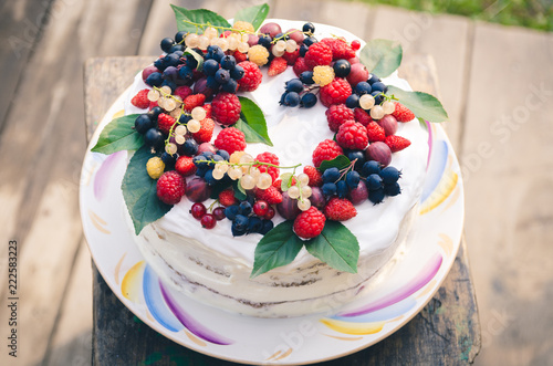 Bisquit cake with berries on top