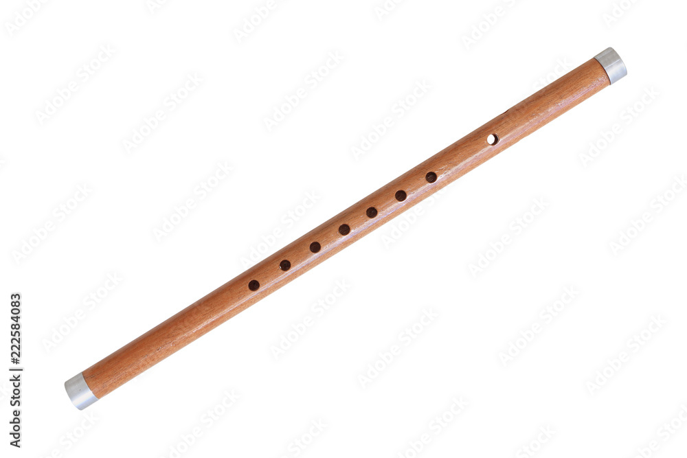Wooden reed pipe or whistle isolated on white background Wooden reed pipe or whistle isolated on white background