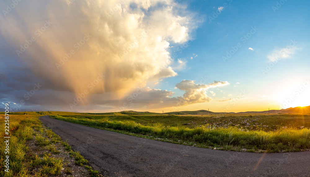 Panorama of the road at sunset in the high plateau