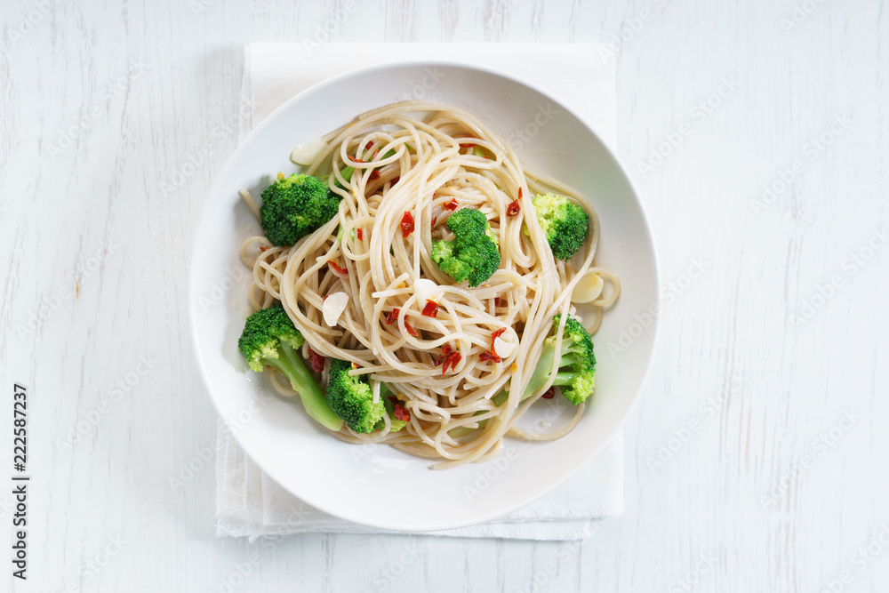spaghetti broccoli on white plate