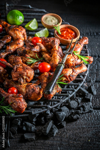 Tasty roasted chicken wings with rosemary and spices