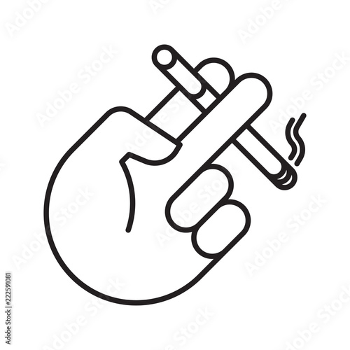 Hand holding a cigarette between fingers