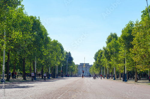 Tourists on The Mall looking southwest towards Buckingham Palace in summer, London photo
