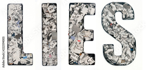Bild auf Leinwand the word  LIES made up of lots of cut up newspaper