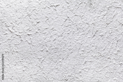 Decorative paper imitates the old gray plaster or vintage silver surface of the facade.