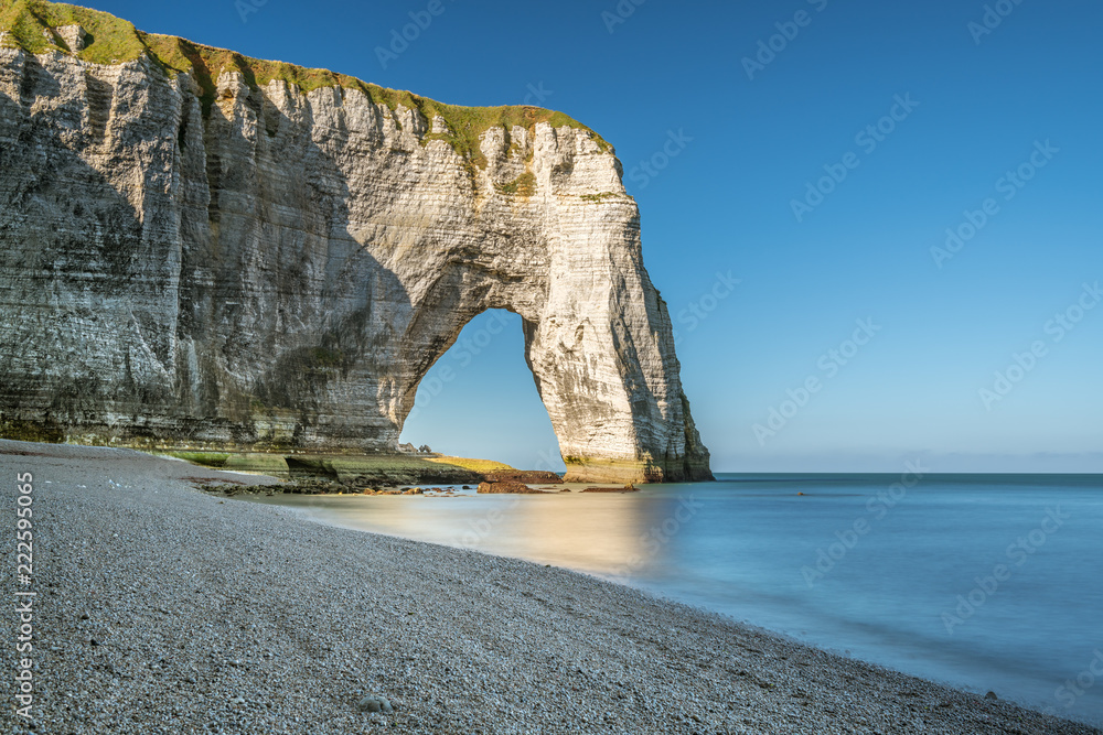 Chalk cliffs of Etretat with the natural arch called Manneporte
