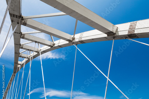 White steel cable-stayed bridge fragment