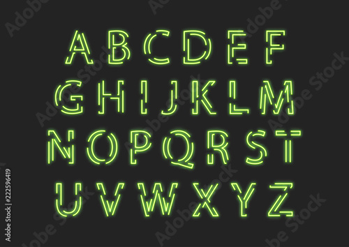 Neon uppercase green alphabet made of intermittent luminous contour.