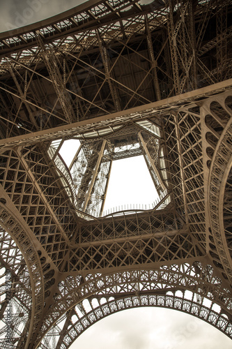 Bottom view of famous Eiffel Tower in Paris, France