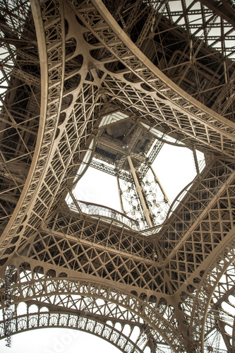 Bottom view of famous Eiffel Tower in Paris, France
