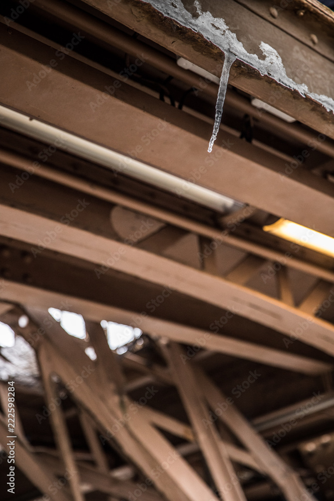 Stalactites in Eiffel Tower on a winter day Stalactites in Eiffel Tower on a winter day