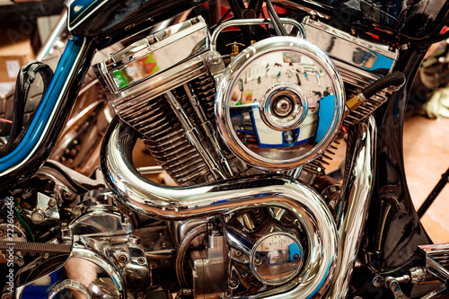 Engine close up shot of beautiful and custom made motorcycle photo