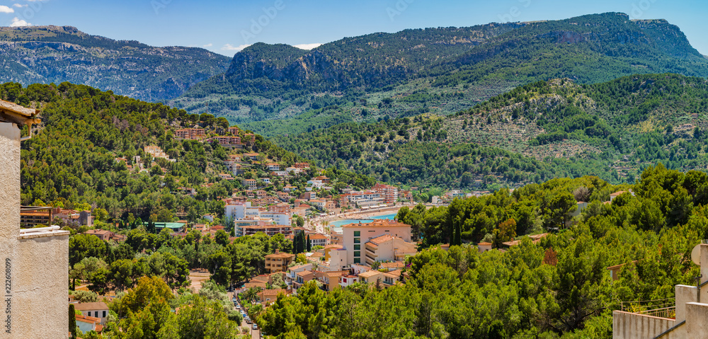Aerial panoramic view of Port de Soller Mallorca with beautiful mountain scenery of Sierra de Tramuntana