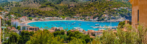 Marina of Port de Soller with view of beach and boats at bay, Mallorca, Balearic Islands © vulcanus