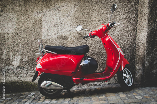 Red scooter parked on a street in Bern Switzerland