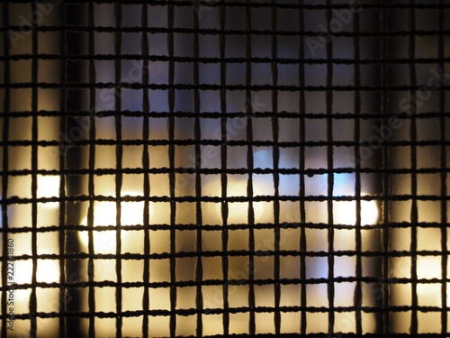 curtains looking like a net with an abstract night city background