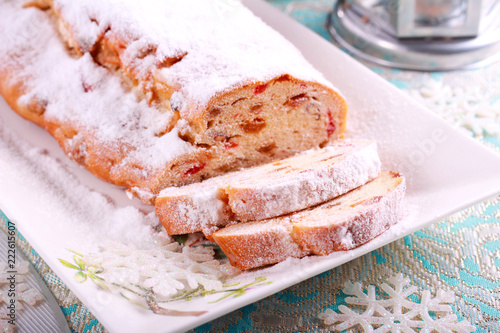 Christmas stollen cake with icing sugar,