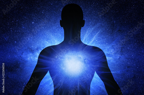 Silhouette of man with universe background