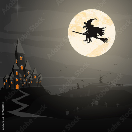 Halloween witch in front of full moon