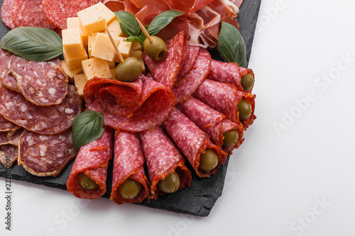 Cold smoked meat plate on a white background