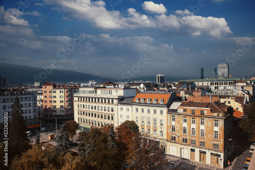Aerial view of East European City. Many buildings with a mountain background. Urban sprawl. Rila hotel view. Bulgaria, Sofia - September 1, 2018