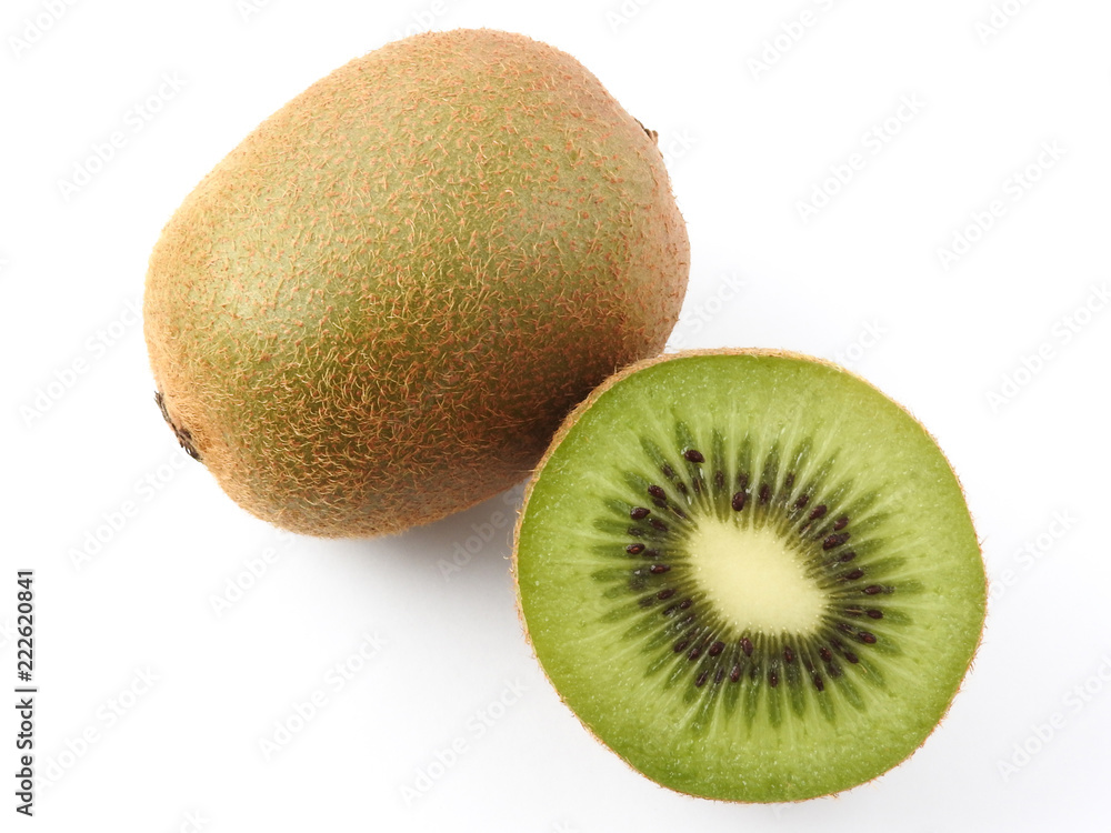Top view of ripe fresh kiwifruits isolated on white background. Kiwi has fibrous, flesh and edible black seeds.Fruit, nature, health and nutrition concept. Summer food. Copy space. Top view of ripe fresh kiwifruits isolated on white background. Kiwi has fibrous, flesh and edible black seeds.Fruit, nature, health and nutrition concept. Summer food. Copy space.