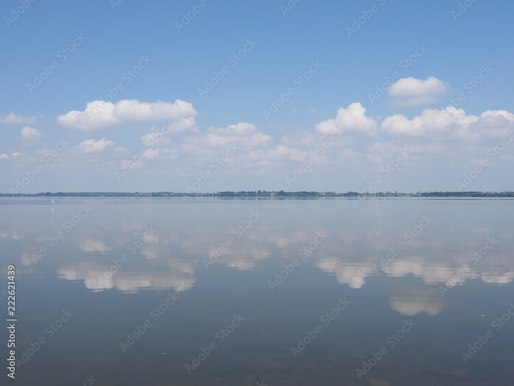 Fantastic landscape of artificial european Goczalkowice Reservoir in Poland with beauty clouds on blue sky