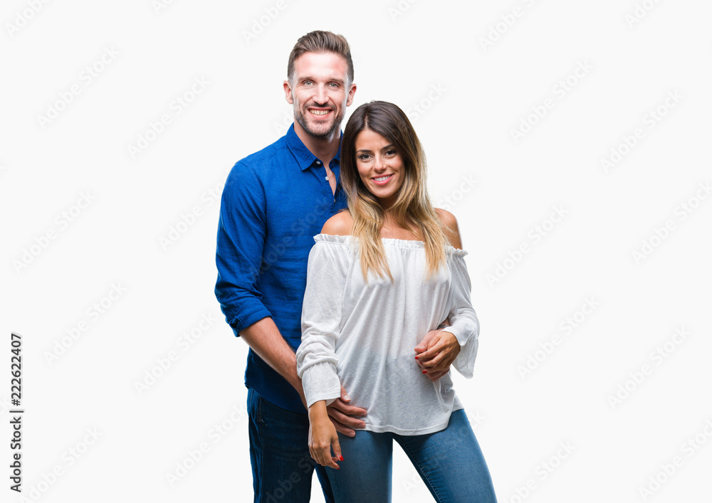 Young couple in love over isolated background with a happy and cool smile on face. Lucky person. Young couple in love over isolated background with a happy and cool smile on face. Lucky person.