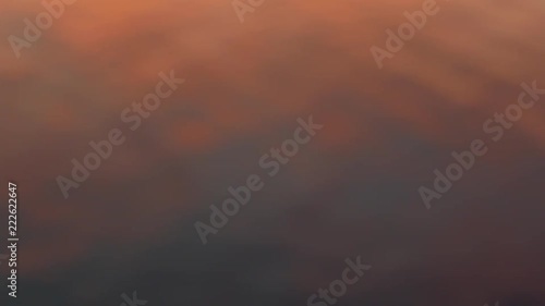 Waving surface with orange spots