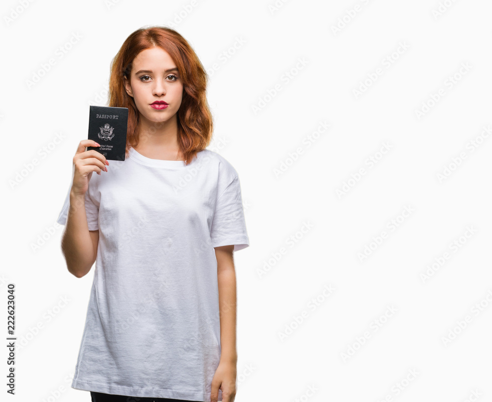 Young beautiful woman holding passport of united states of america over isolated background with a confident expression on smart face thinking serious Young beautiful woman holding passport of united states of america over isolated background with a confident expression on smart face thinking serious