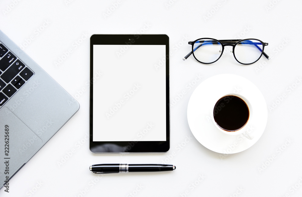 Working with tablet,Laptop computer,Hot coffee copy space on White table background.Top view,Flat lay,style Minmal workspace,business Concept Working with tablet,Laptop computer,Hot coffee copy space on White table background.Top view,Flat lay,style Minmal workspace,business Concept