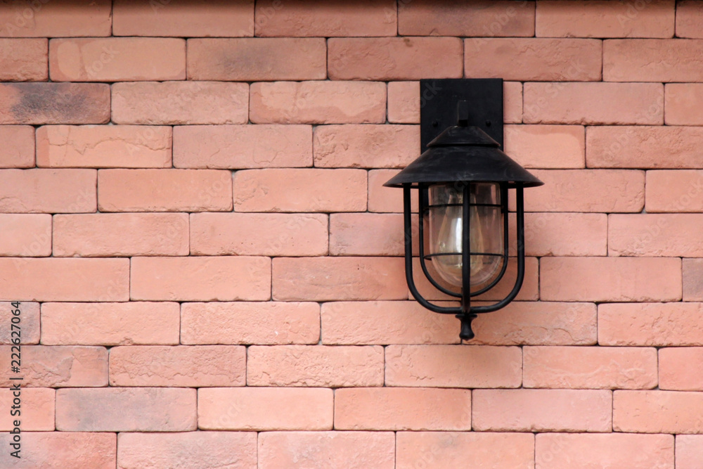 wall lamp on the brick wall