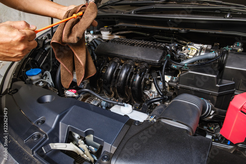 Professional check  engine oil   details and cleaning before traveling ,For safety © chaphot