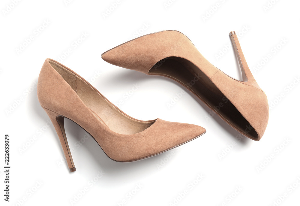 Pair of beautiful shoes on white background, top view