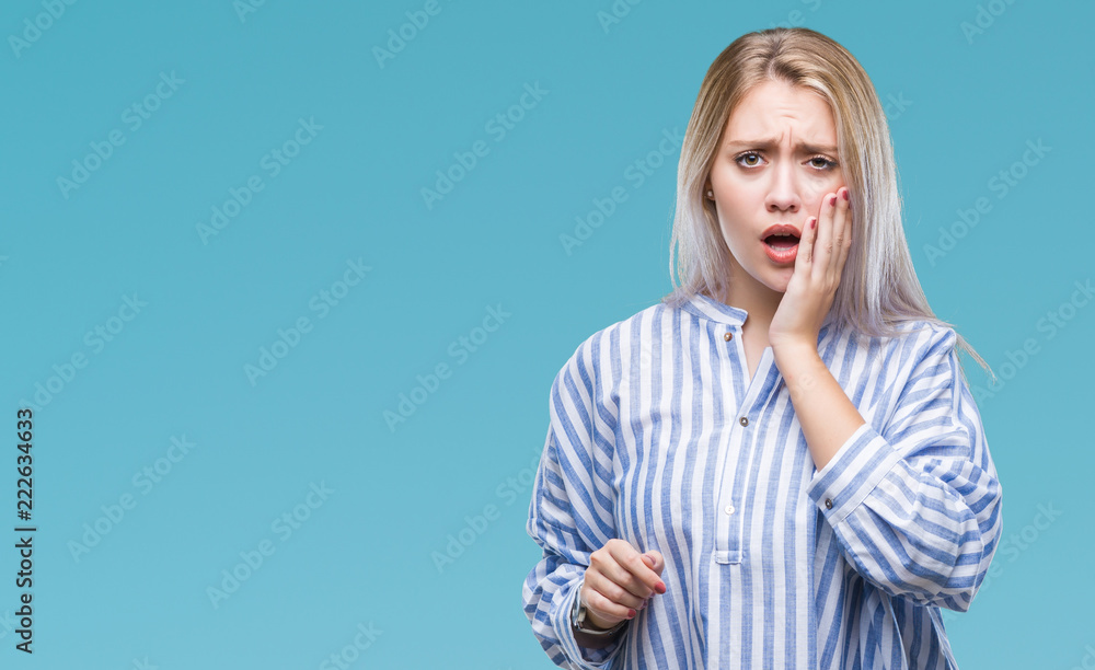 Young blonde woman over isolated background touching mouth with hand with painful expression because of toothache or dental illness on teeth. Dentist concept.