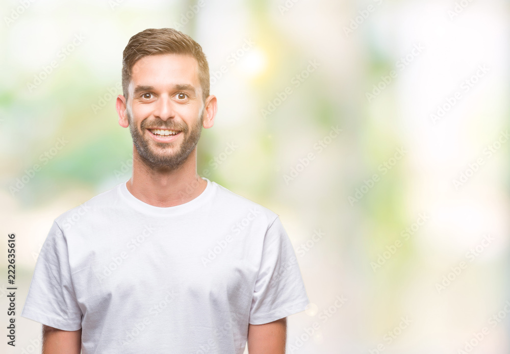 Young handsome man over isolated background with a happy and cool smile on face. Lucky person. Young handsome man over isolated background with a happy and cool smile on face. Lucky person.