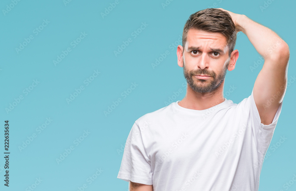 Young handsome man over isolated background confuse and wonder about question. Uncertain with doubt, thinking with hand on head. Pensive concept. Young handsome man over isolated background confuse and wonder about question. Uncertain with doubt, thinking with hand on head. Pensive concept.