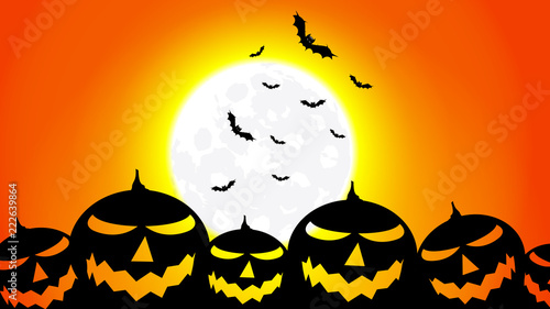 silhouette of a pumpkin against the background of the full moon