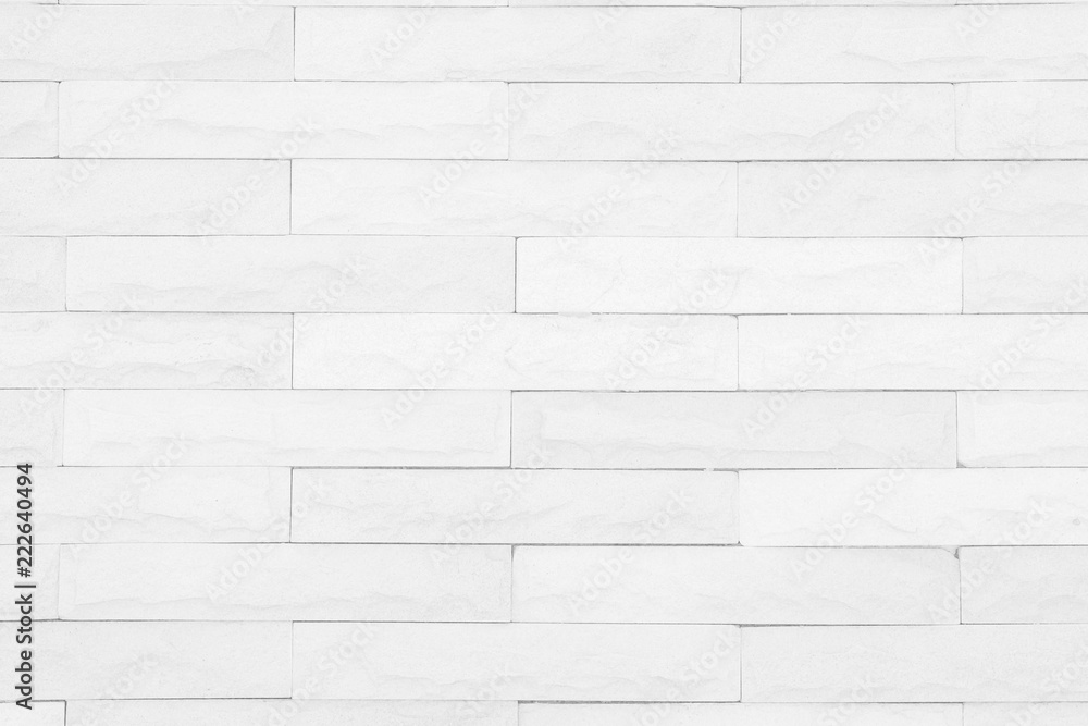Seamless White pattern of decorative brick sandstone wall surface with concrete of modern style design decorative uneven have cracked realmasonry wall of multicolored stones or blocks with cement. Seamless White pattern of decorative brick sandstone wall surface with concrete of modern style design decorative uneven have cracked realmasonry wall of multicolored stones or blocks with cement.