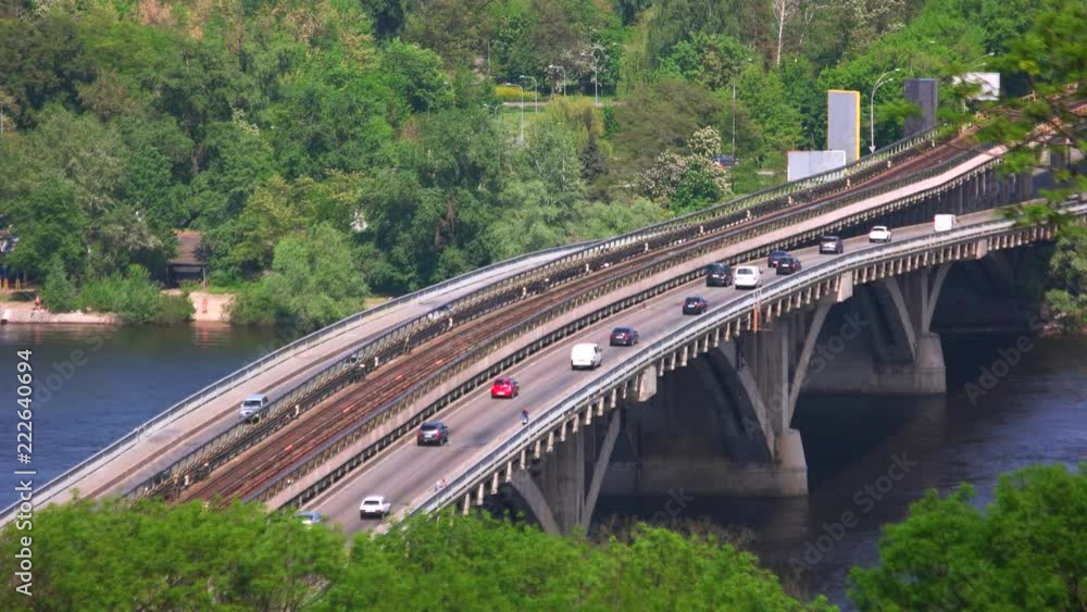 Car traffic on the bridge. Urban landscape, aerial view. Car traffic on the bridge. Urban landscape, aerial view.