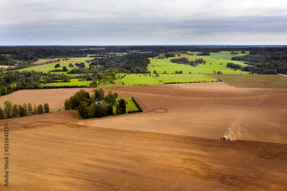 Fototapeta premium Brown agricultural fields in autumn time.