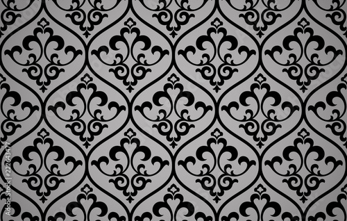 Wallpaper in the style of Baroque. Seamless vector background. Black and grey floral ornament. Graphic pattern for fabric, wallpaper, packaging. Ornate Damask flower ornament
