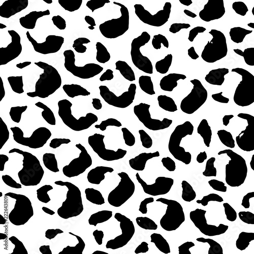 Vector illustration leopard print seamless pattern. Black and white hand drawn background.