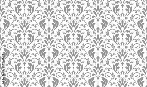 Wallpaper in the style of Baroque. Seamless vector background. White and grey floral ornament. Graphic pattern for fabric, wallpaper, packaging. Ornate Damask flower ornament.
