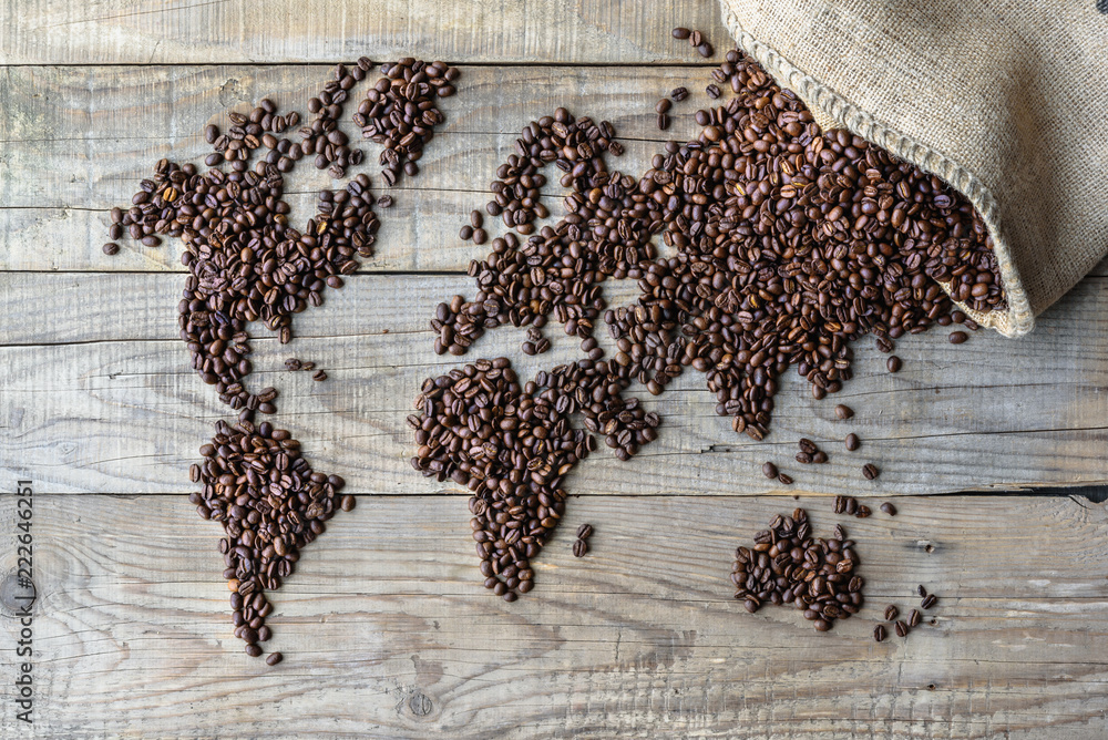 Fototapeta World of Coffee - fresh roasted coffee beans conceptual background