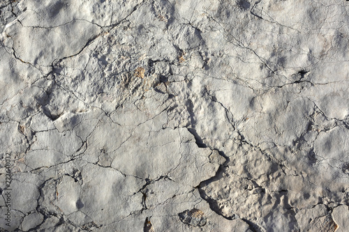 Cracked limestone background © heliopix