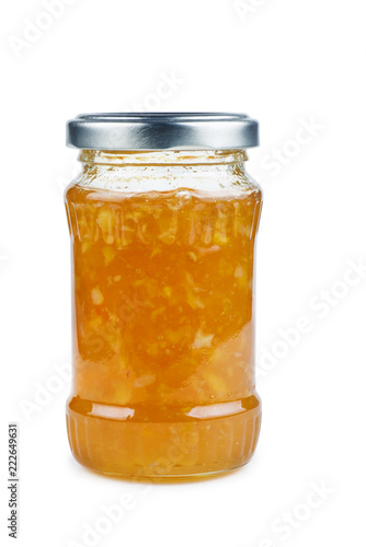 Homemade lemon jam in glass jar isolated on white background