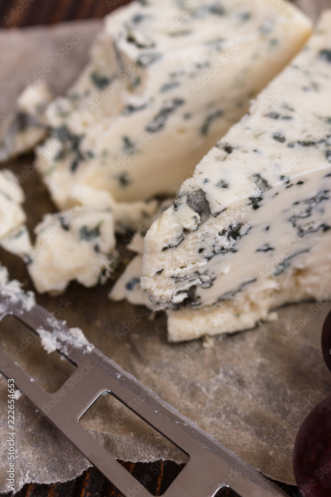 delicious blue cheese on wooden rustic background delicious blue cheese on wooden rustic background